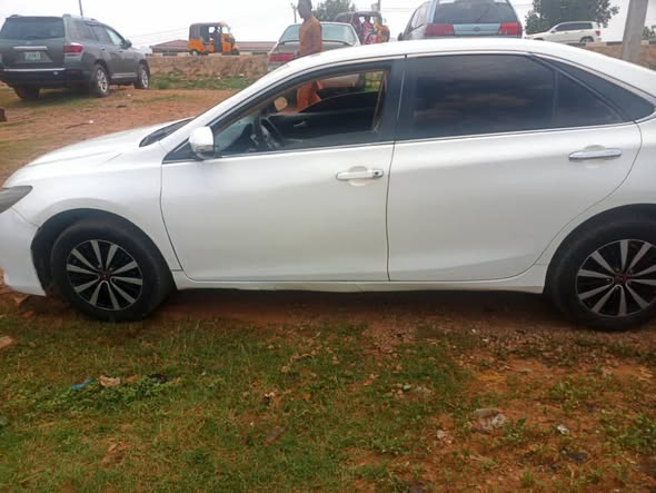 A picture of Distress Distress Distress Toyota Camry 2016 untermperd and gear AC