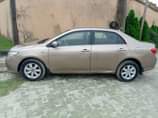 A picture of Awoof Awoof Awoof Registered 2010 Corolla LE fabric seat keystart