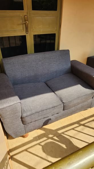 A picture of 2 seater a n d a sofa bed