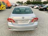 A picture of Toyota Corolla 2013 model neat and clean car just buy