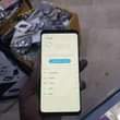 A picture of Pink screen samaung s9plus 64gb 6gbram At 200k Call 0788400877