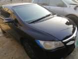 A picture of IMAGINE OOOO THIS BEAUTIFUL BAE HONDA CIVIC 2006 Is leaving