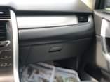 A picture of Registered 2014 Ford Edge SE AWD Thumbstart Infotainment screen leather