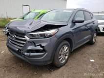 A picture of Hyundai Tucson Limited 2017 Gray 2.0L 4 vin KM8J3CA40HU302239