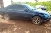 A picture of Toyota Camry tiny light Bake once Clean as seen ac