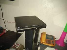 A picture of 32 frameless TV Antenna A DVD player