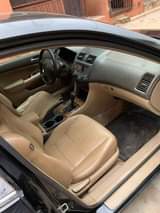 A picture of 2004 Honda Accord Neatly baked Super cool engine Clean Leather