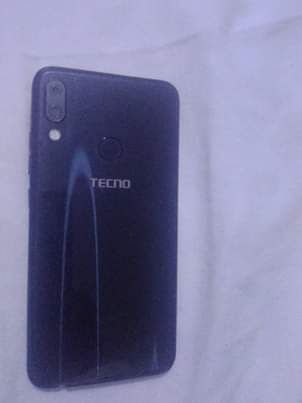 A picture of 3 seaters sofa and CAMON 11