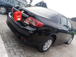 A picture of Registered Toyota Corolla 2010 model buy nd drive location Lagos