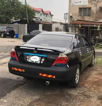 A picture of Clean Nigerian Used Black Toyota Camry 2004.