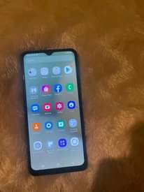 A picture of Samsung a12 internal 64gb ram 4gb haina kipengele nicheck tuzungumze