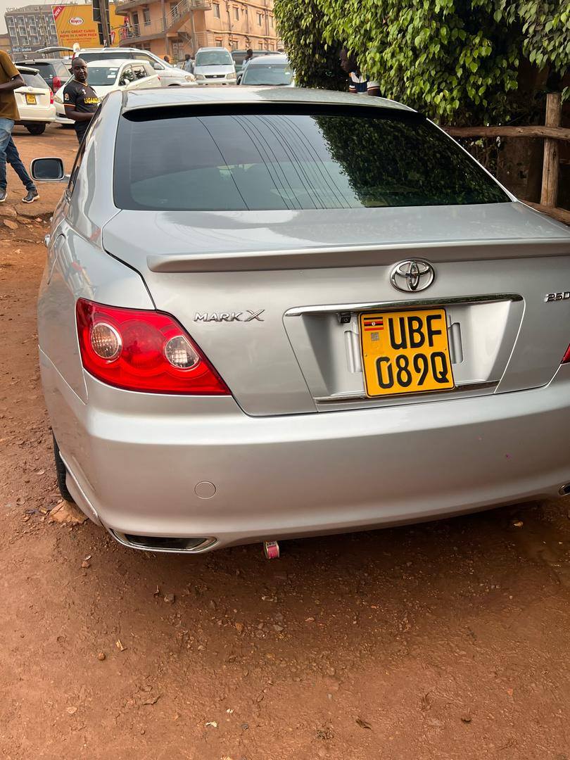 A picture of Toyota mark x and subaru gc8