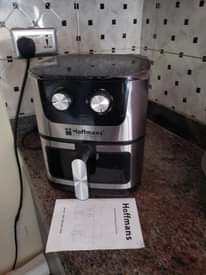 A picture of Lg fridge tv air fryer sofas and sale all in