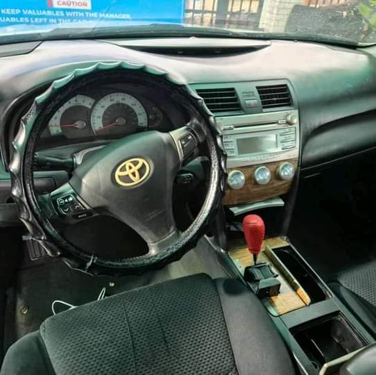 A picture of 09 super Clean Toyota Camry Sport. Absolutely buy and drive.