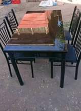 A picture of Dinning table Kaliiii mnooo juu kiooo. 240000. piga. 0789371473