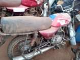 A picture of Bajaj boxer and TVs