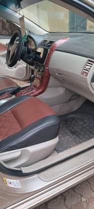 A picture of Fairly used Toyota corolla 2011 2012 Model Painted on first