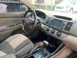 A picture of Registered Toyota Camry 2004 model V4 cylinder engine Interior Clean
