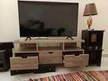 A picture of Lamp Tv stand and fire place