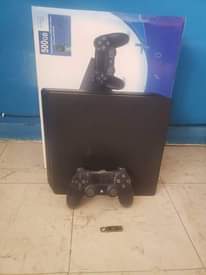 A picture of Unbox slim playstation 4 1 terabyte terhacked with at least