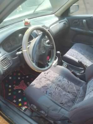 A picture of Mazda 232f Complete first body Buy and use Manual gear