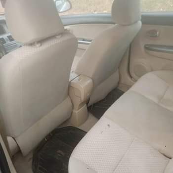 A picture of Toyota Yaris 2014 model with small engine v4