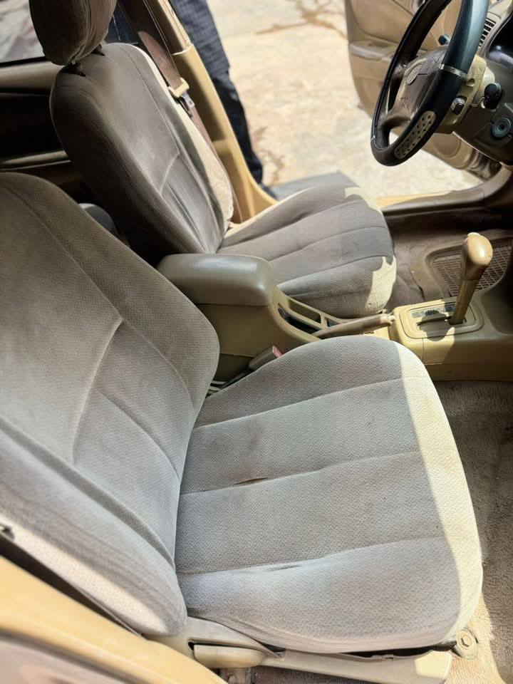 A picture of Faded First body Toyota Corolla small but mighty just for