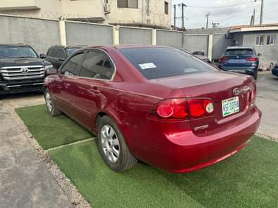 A picture of Kia Optima 2006 model Engine Gear and AC is perfect