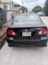 A picture of Toyota Corolla 2004 Engine Ac Gear Painted on first body