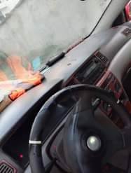 A picture of Toyota Corolla 04 Engine and Ac ok Gear is bad