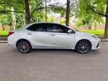 A picture of Toyota Corolla 2015 upgraded to 2018