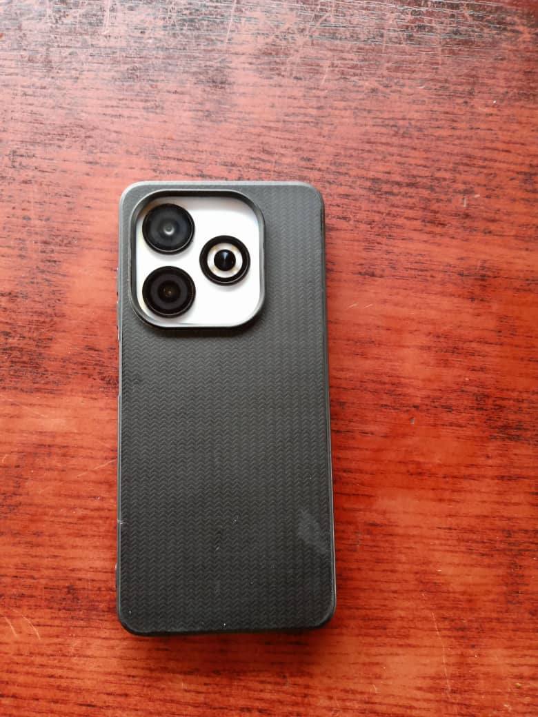 A picture of Infinix Smart 8 with Carton n Receipt 3months used