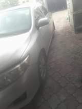 A picture of 2009 corolla still good body buy and drive 07061491876