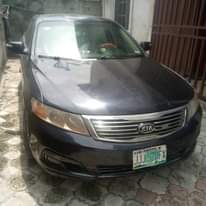 A picture of Clean Kia optima 2010 Everything works perfectly Ac chilling Engine