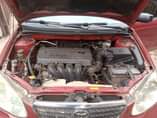 A picture of Come and inspect Toyota corolla 2005 model working with swag