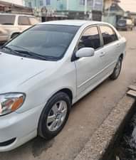 A picture of JUST IN Clean Nigerian Used White Toyota Corolla 2004 Baked