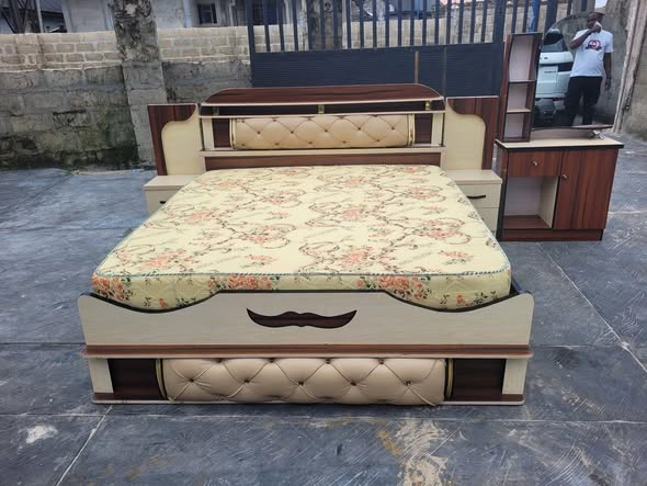 A picture of 6by6 complete set of bedframe and foam with two side