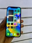 A picture of iPhone 12 64gb 1 45M Faceid working DM WhatsApp or