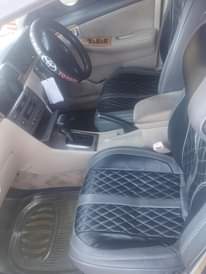 A picture of Toyota RunX cc1490 inauzwa 10m maongezi kwenye gari piga 0768087369
