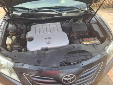 A picture of DISTRESS DISTRESS NEATLY USED 2009 TOYOTA CAMRY XLE WITH BACK