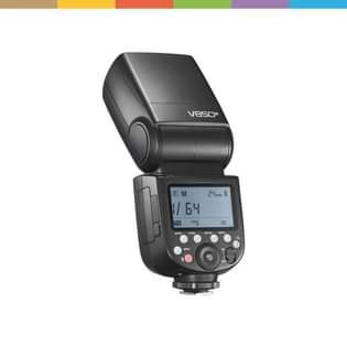 A picture of Camera D7500 a flashlight and a green screen