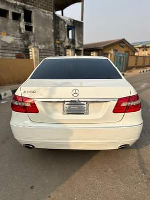 A picture of Mint white Registered 2013 Mercedes Benz E350 in pristine condition