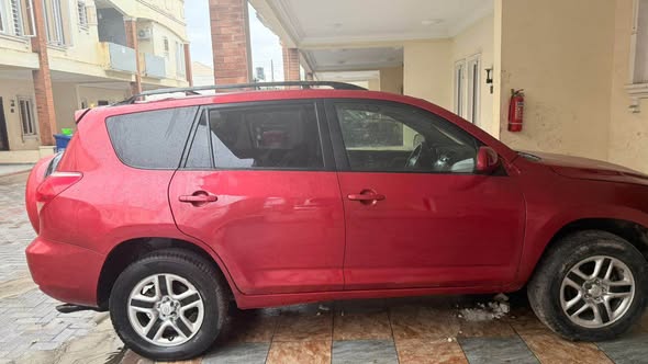 A picture of Sharp used Toyota rav409 for sale painted on first body