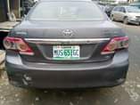 A picture of Money urgently needed for this 2010 Toyota Corolla painted on