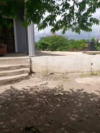 A picture of Eneo lenye nyumba mbili boma ng ombe KILIMANJARO linauzwa