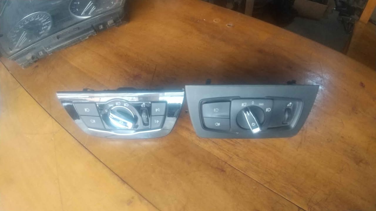 A picture of BMW headlight control button