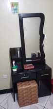 A picture of Matress dressing mirror and center carpet