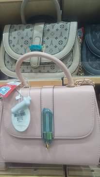 A picture of Bags clutches and back pack