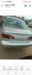 A picture of Toyota Corolla year 2002 engine and transmission and ac is