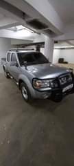 A picture of NISSAN DOUBLE CABIN 33 000 000 2009 MODEL PERFECT CONDITION